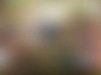 Backyard luau with guests preparing leis