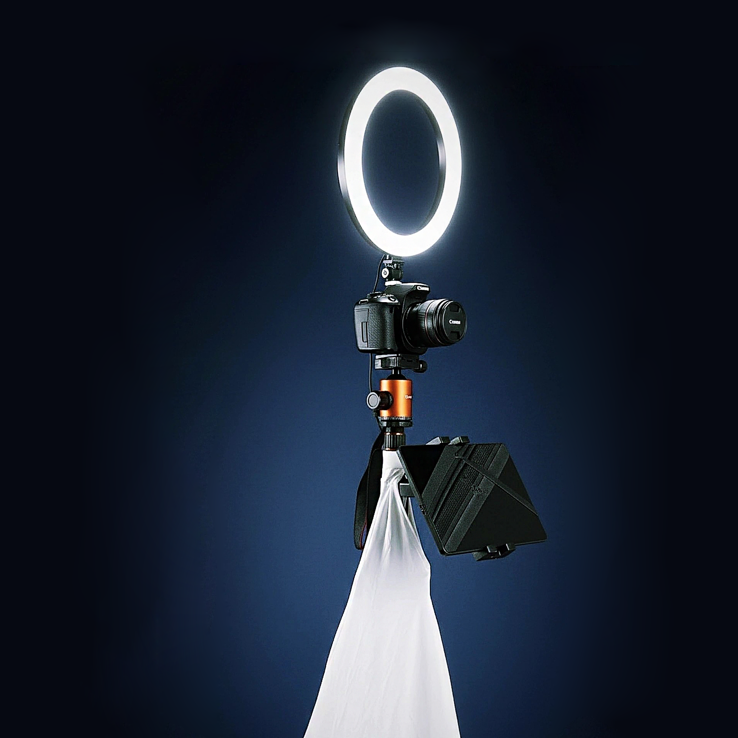 Photobooth camera on tripod with ring light and tablet screen setup