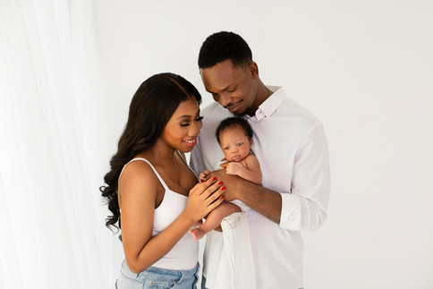 Parents with their newborn baby