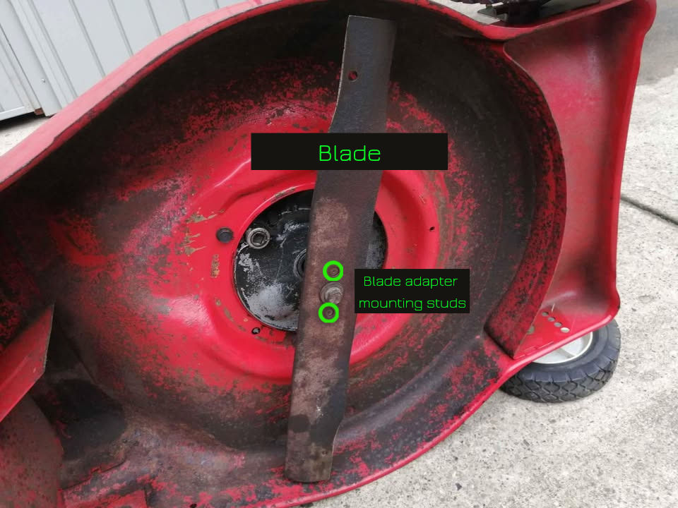 Underside of lawn mower deck