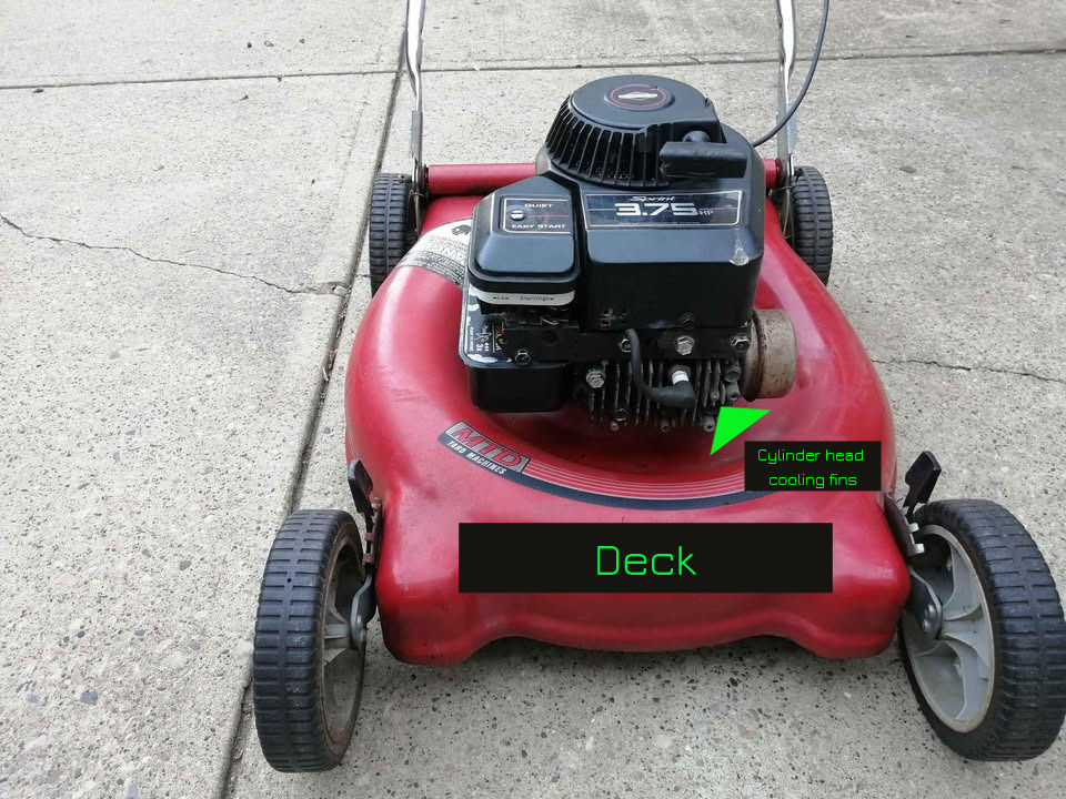 lawn mower engine bolted onto deck