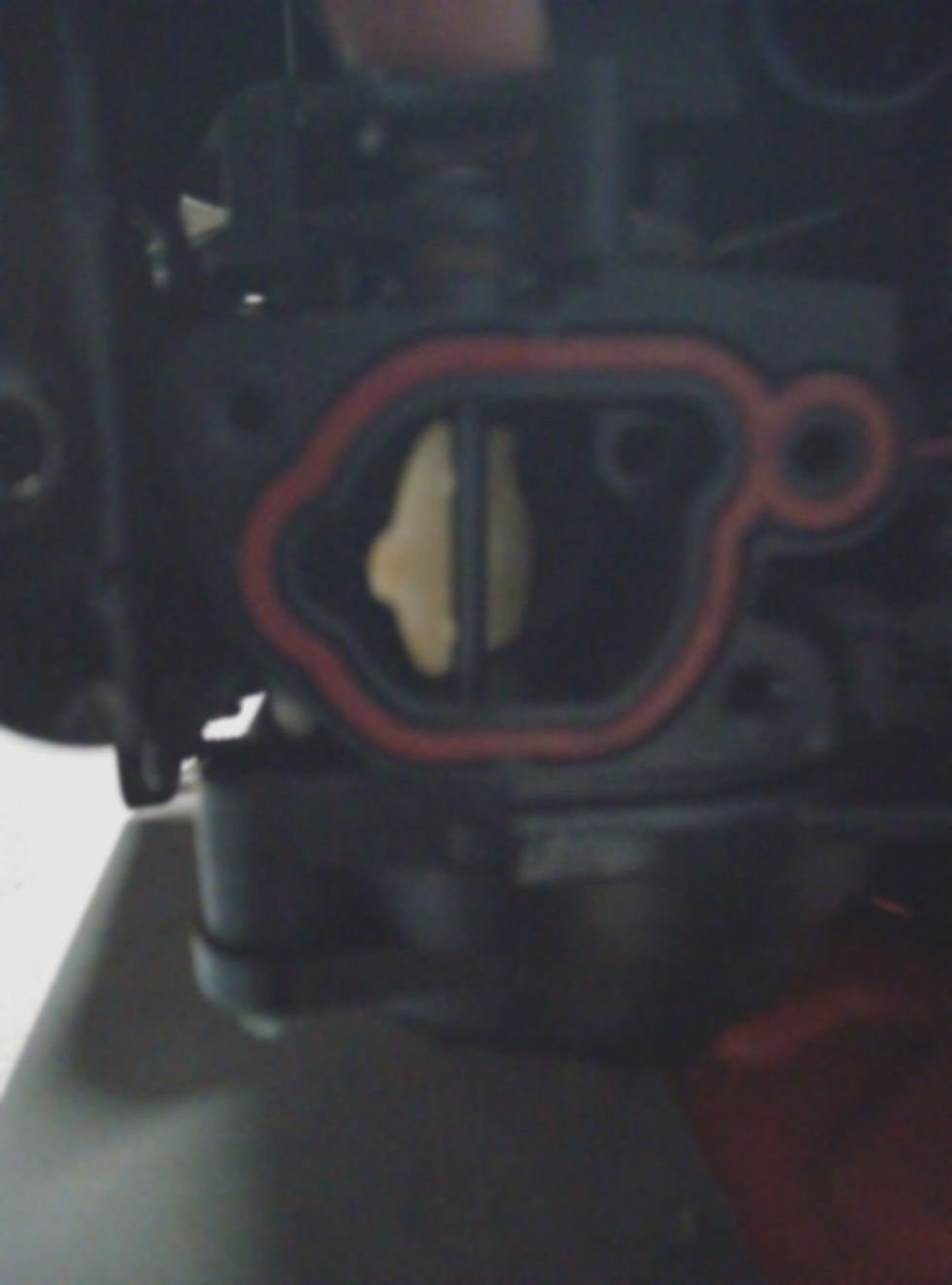 Choke plate in open position when looking into carburetor throat