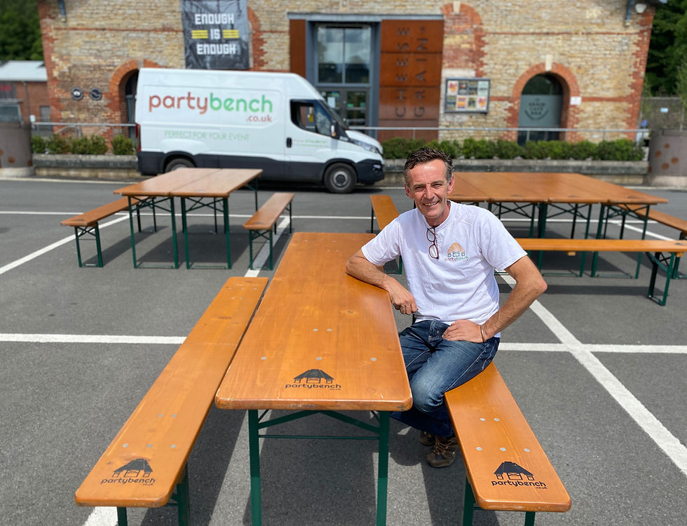 Partybench tables and benches set up in Frome outside the Cheese and Grain