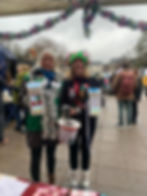 Emma Warren (left) and Lenka Grimes (right) collecting for Fair Frome and the Christmas get together