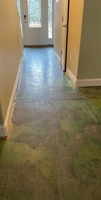 Mottled green and gray concrete floor