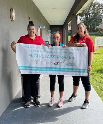 Three smiling adults holding a white banner with "HIGH CLASS Provider" text.