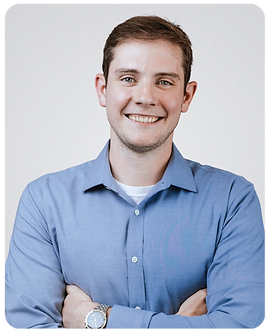 Hayden Jacobs headshot male in a blue button down shirt