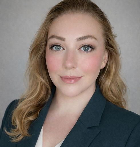 A photo of Maggie Reid, the owner and digital marketing specialist at Peace Country Marketing