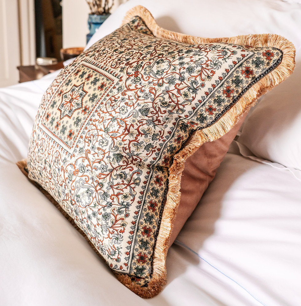 Vintage rust and green paisley print cushion