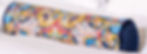 Brightly patterned silk bolster cushion