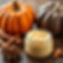 body butter with a pumpkin and spice in the background.jpg