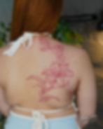 Fine-Line-Color-Back-Flower-Tattoo