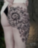 Fine-Line-Flower-Lion-Upper-Leg-Girl-Tattoo-in-Bali