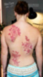 Fine-Line-Color-Back-Flower-Tattoo