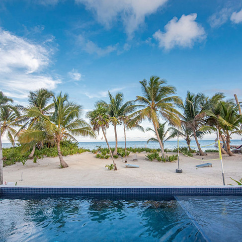 Private pool with built in bench to stare out at the ocean and a built in sun deck for lounging or kids playing.