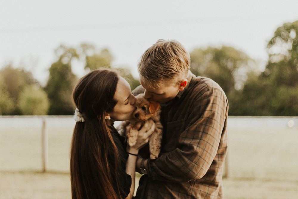 A great idea for a couple's photo shoot with a puppy.