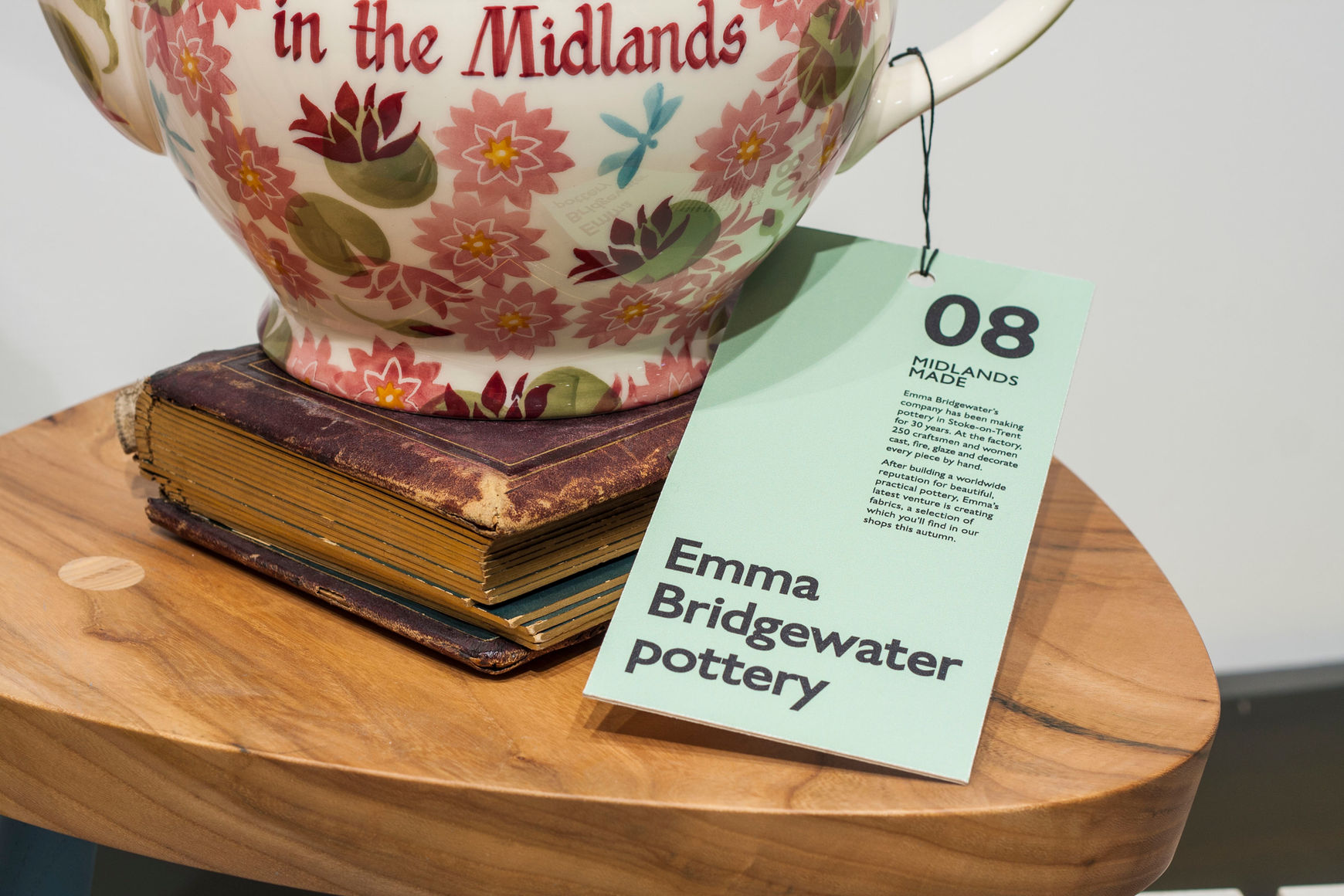 Photo of a teapot with label, illustrating product-level copywriting completed