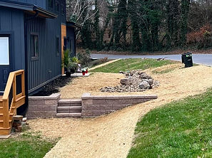 block retaining wall blue house.jpg