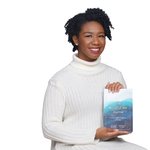 Woman smiling holding a journal in her hand that says Mindful Me Journal