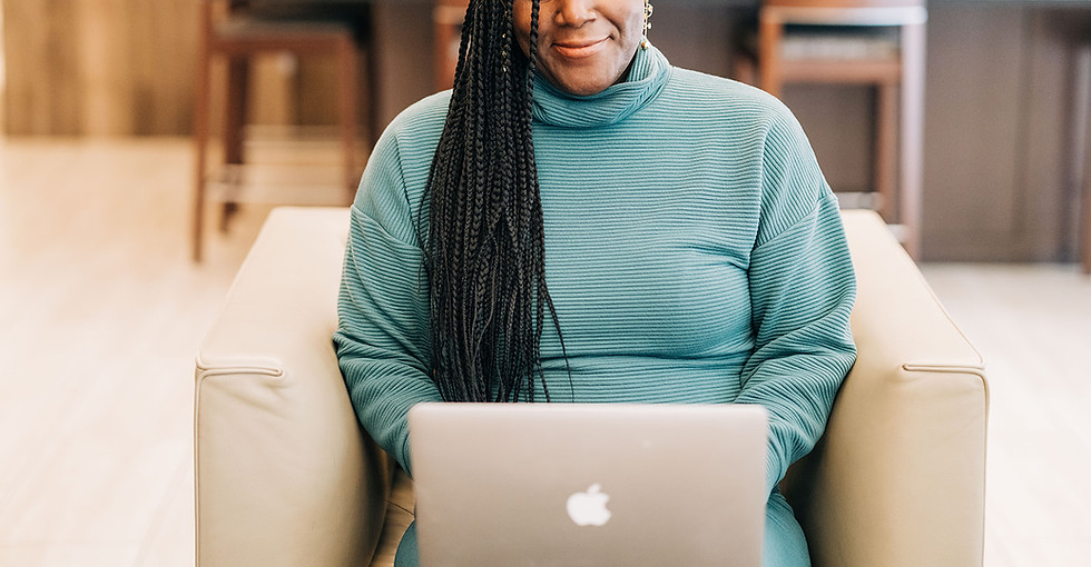 a picture of lakeisha adamson at her computer working