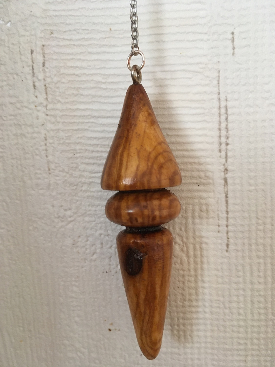 Pendule  en bois d’Olivier 