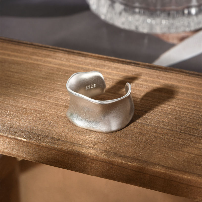 Thumbnail: Collection of 15 stainless steel rings with a vintage geometric texture.