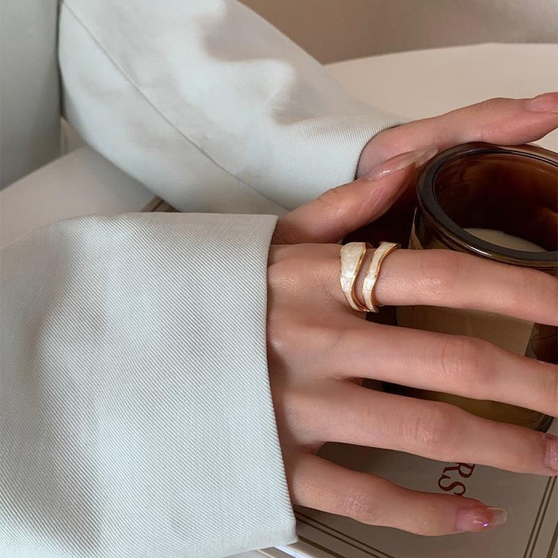 Thumbnail: Serene ring, adjustable, geometric irregular shape in vintage white enamel metal
