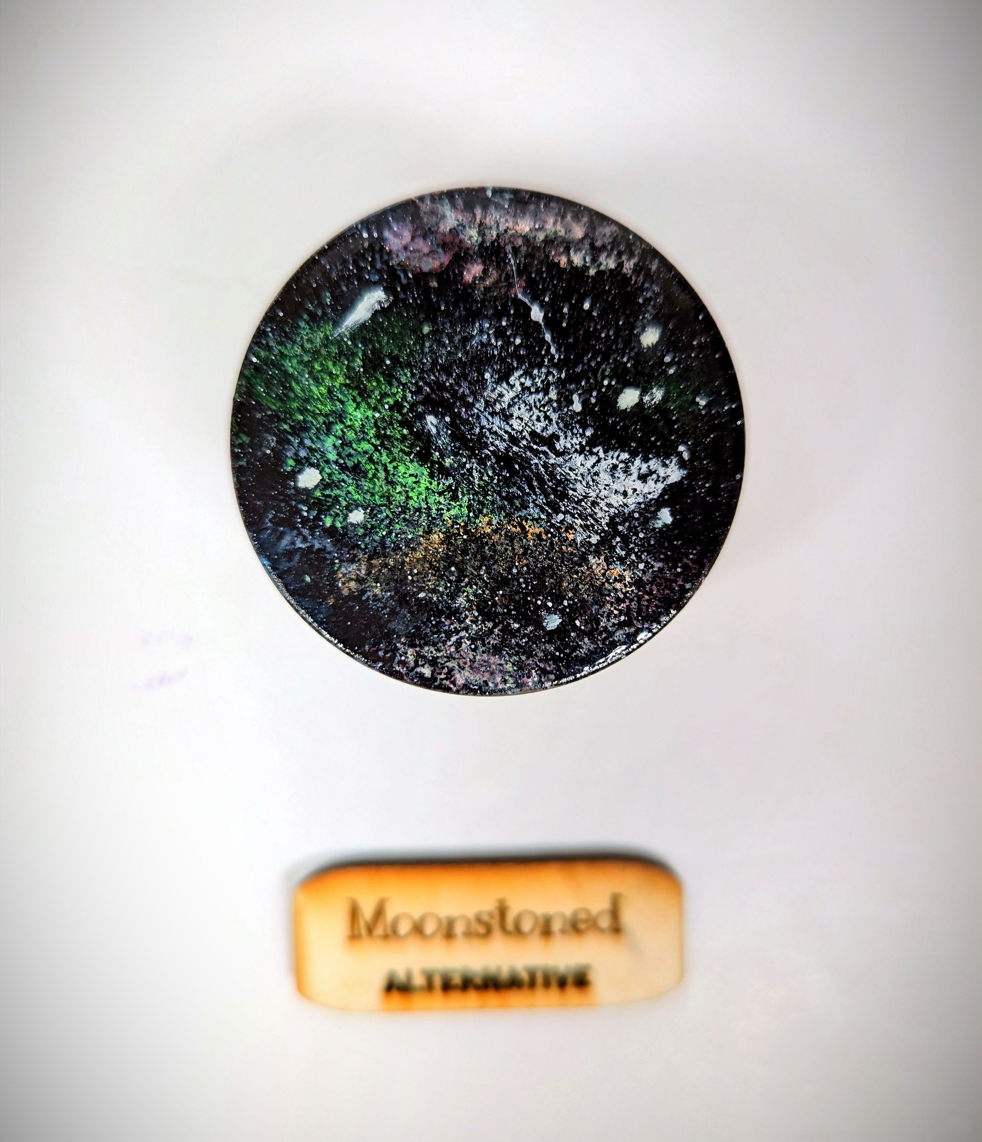 Close up Neon galaxy grinder top