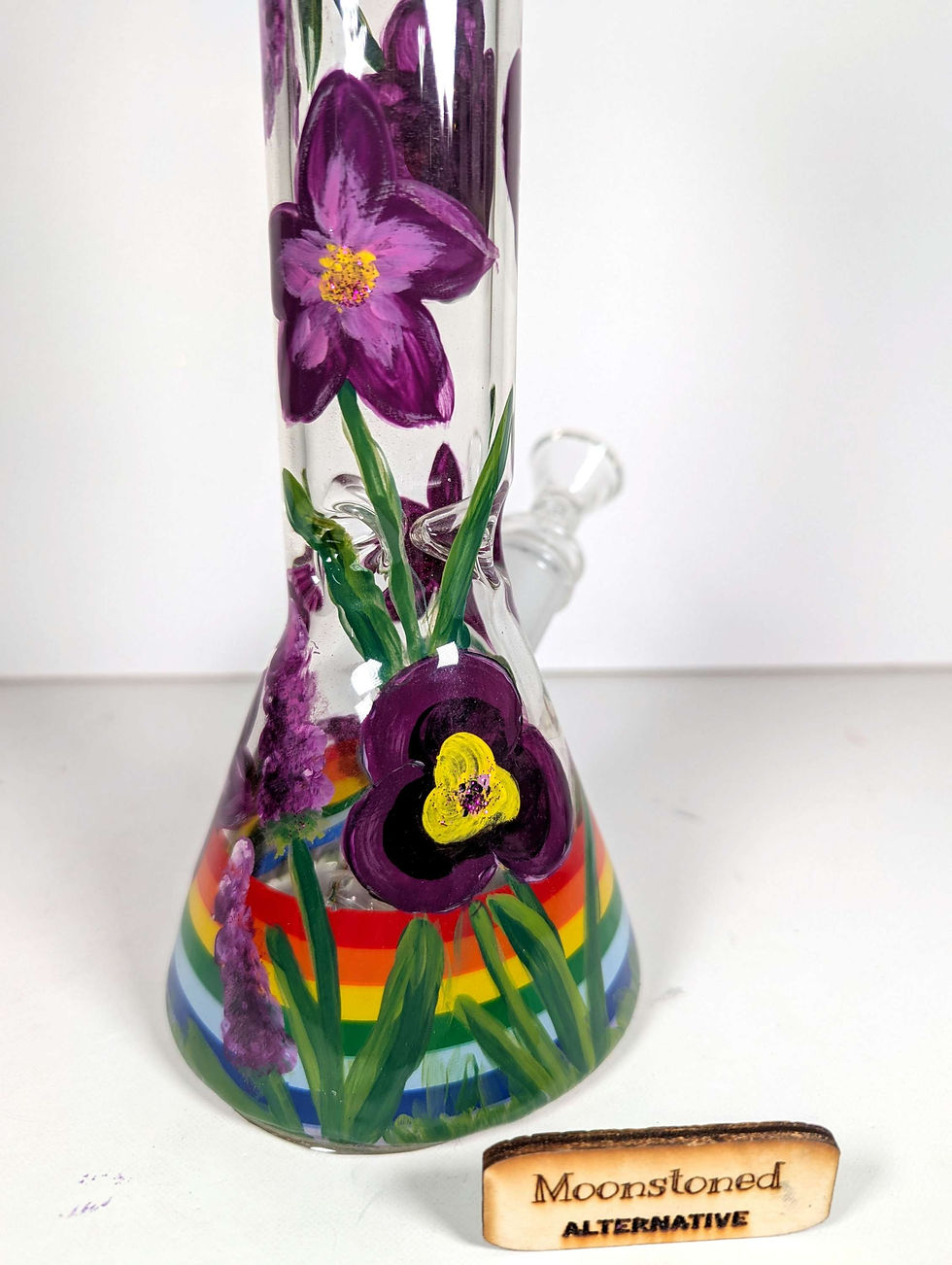 Thumbnail: Close up view of the main body showing the hand-painted violets and pansies on the "Lavender love" 10" bong.