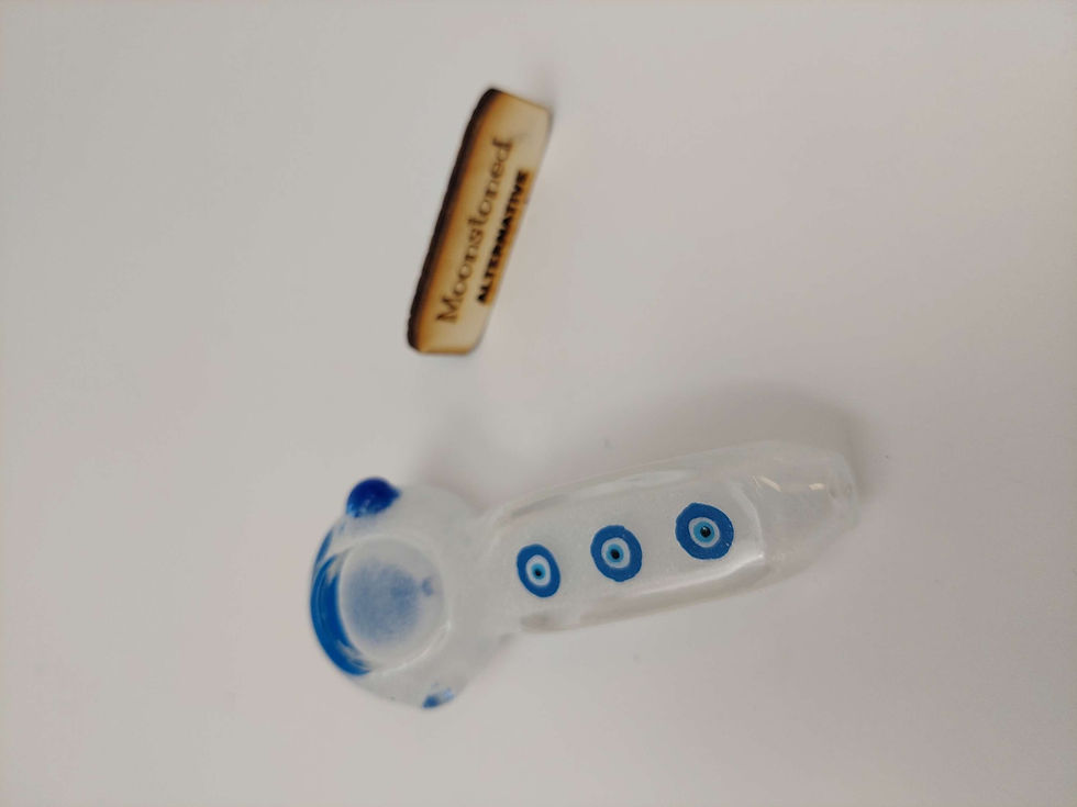 Thumbnail: Overhead view of the Evil eye pipe and its hand-painted eyes. 