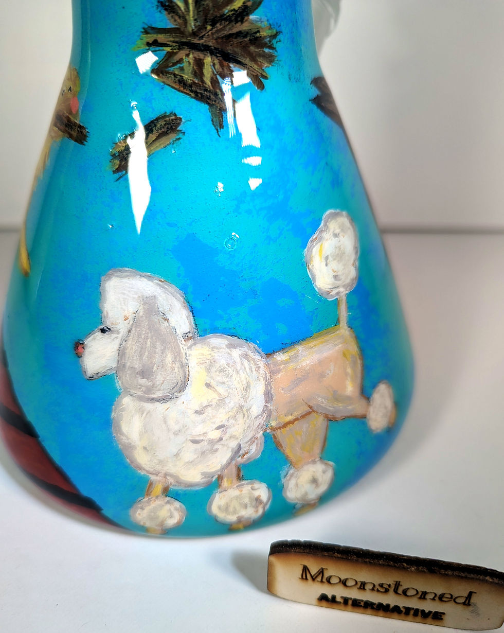 Thumbnail: Close up view of the Poodle doing tricks on the agility course on the Dogs and Doobies 12" Bong