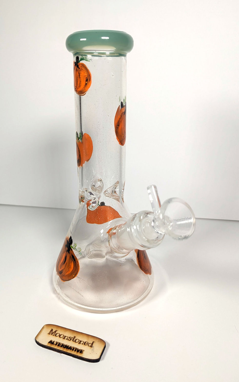 Thumbnail: left side view of the "pumpkin harvest" 8" beaker bong