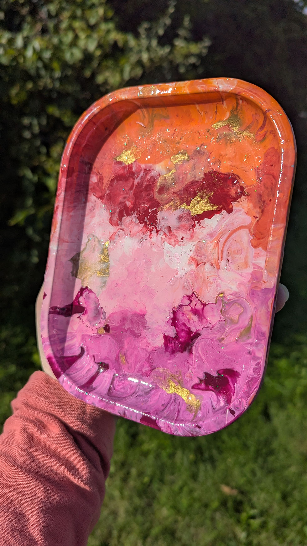 Alternate view of the Sapphic Heat Pride Mini rolling tray in natural lighting showing the metallic gold shine in the sun