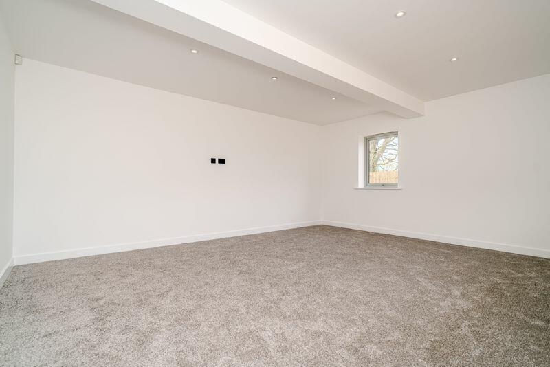 An empty room before staging.