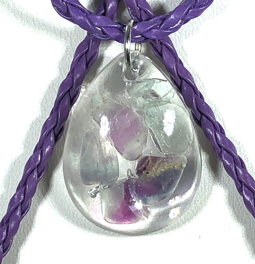 Thumbnail: Fluorite Crystal necklace set in resin
