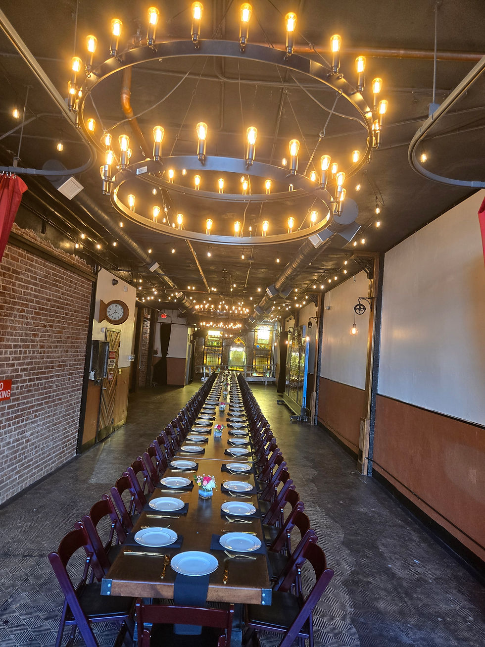 Eye-level view of a stylish wedding venue downtown Atlanta with elegant decor and city skyline in the background