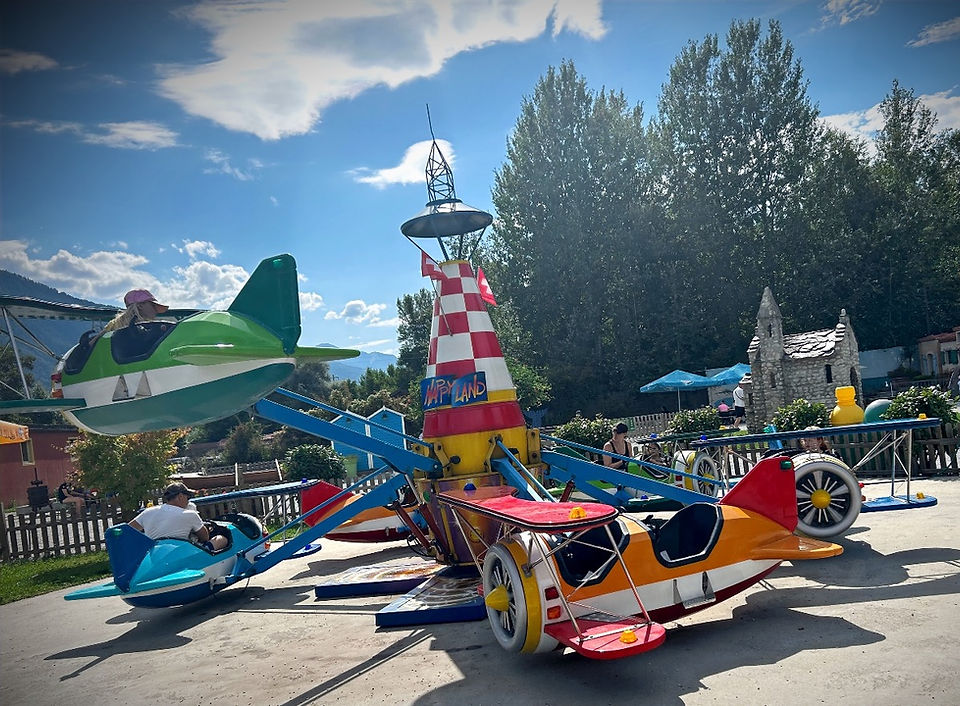 Happyland amusement park airplanes carousel