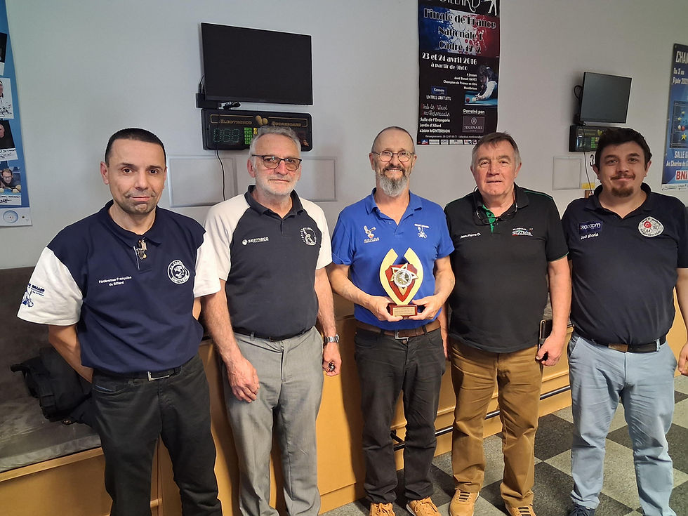 Les joueurs de la finale. JYves Marchand champion