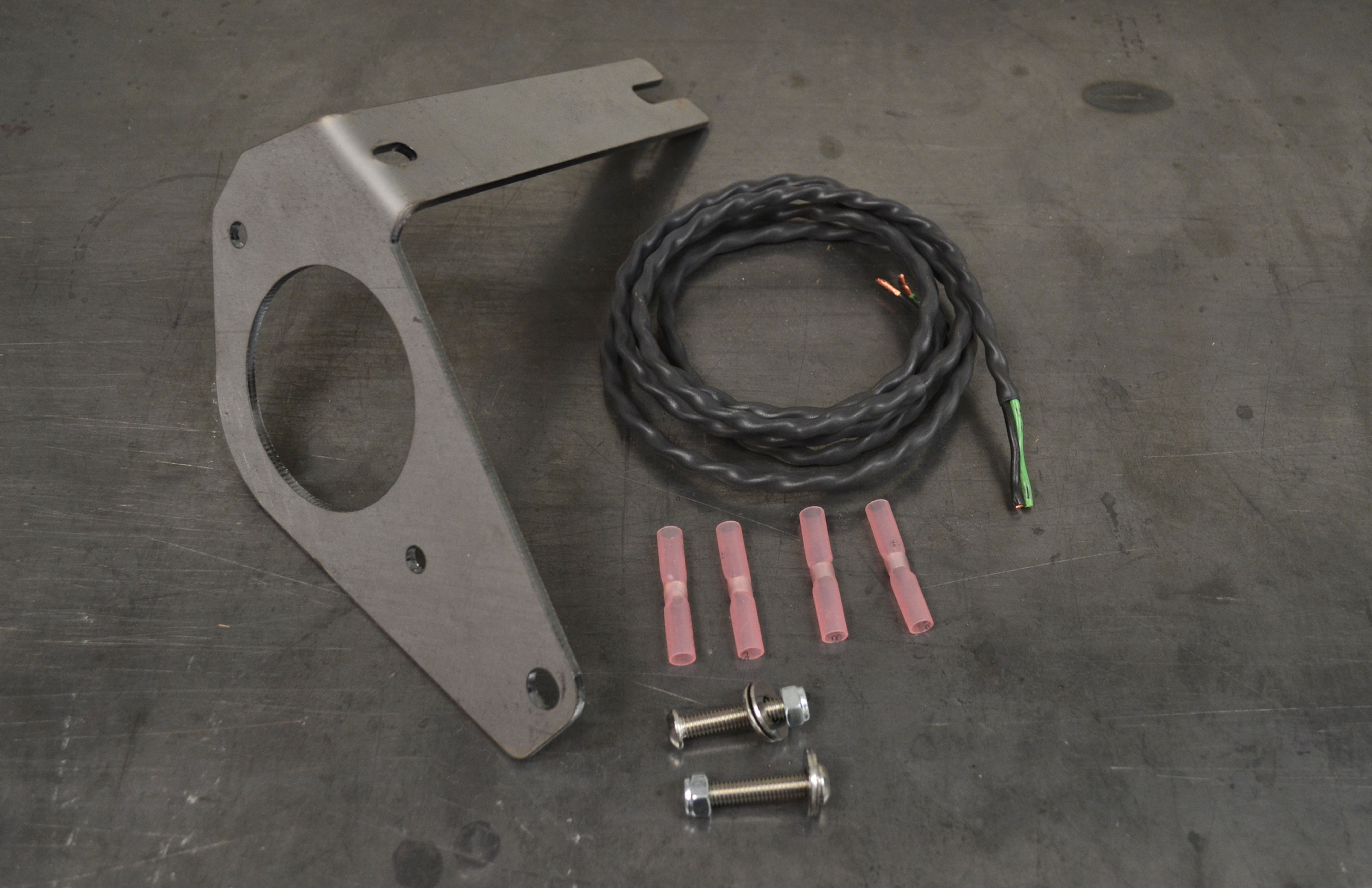 Under Hood Vacuum Pump Relocation Bracket