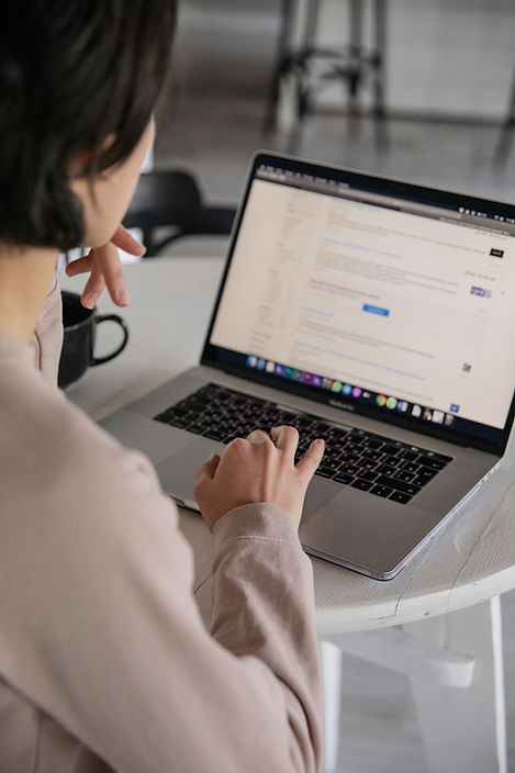 SEO specialist writing content and reviewing metadata strategy
