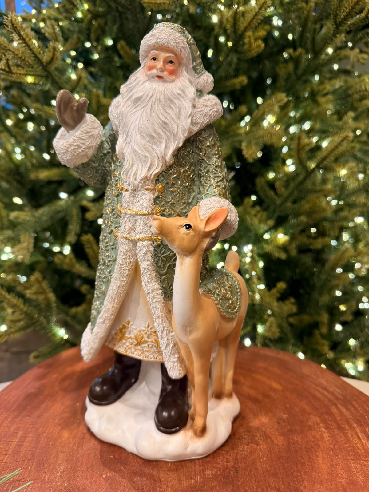 PAPAI NOEL C/ RENA RESINA 30CM (VERDE/CHAMPANHE) - 1UN