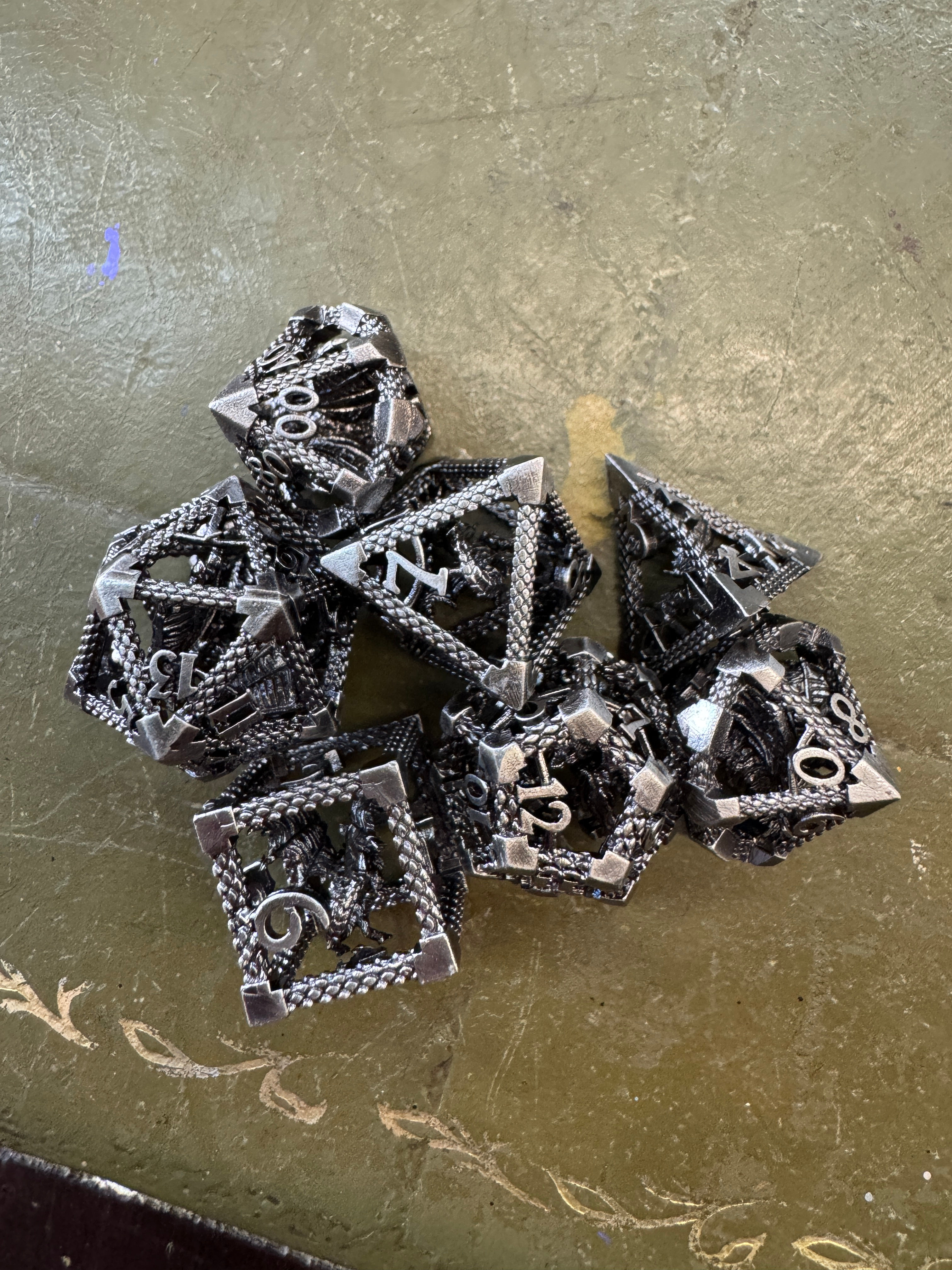 Gun Metal hollow metal dragon dice