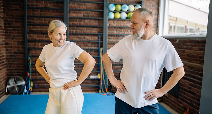 Healthy and happy couple in the gym