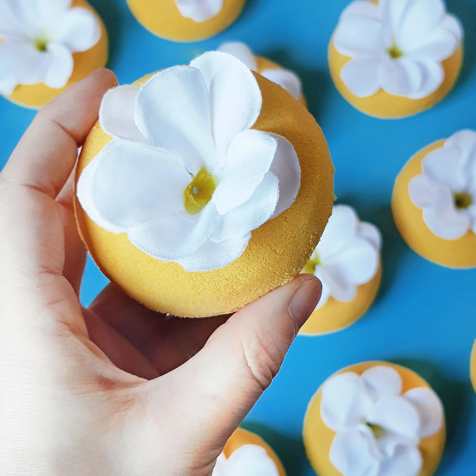 Thumbnail: Yellow frangipani doughnut bath bomb