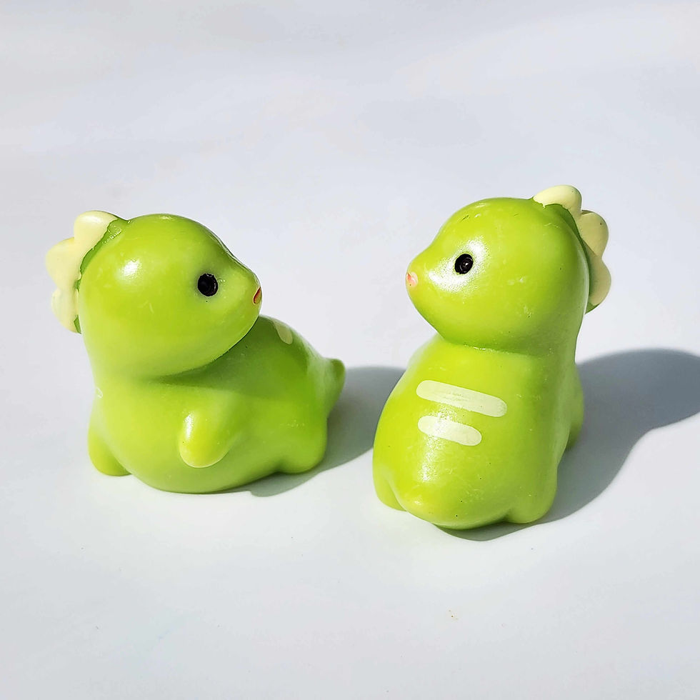 Thumbnail: two fat looking green dinosaurs on a white background
