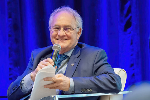 smiling man on stage