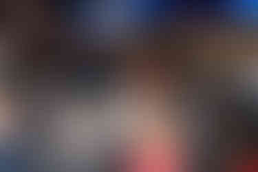 seated conference attendees chatting