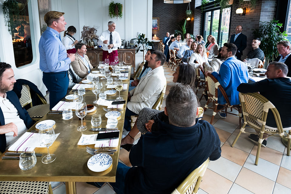 François de Gaspé Beaubien speaking to dinner guests at a VIP dinner