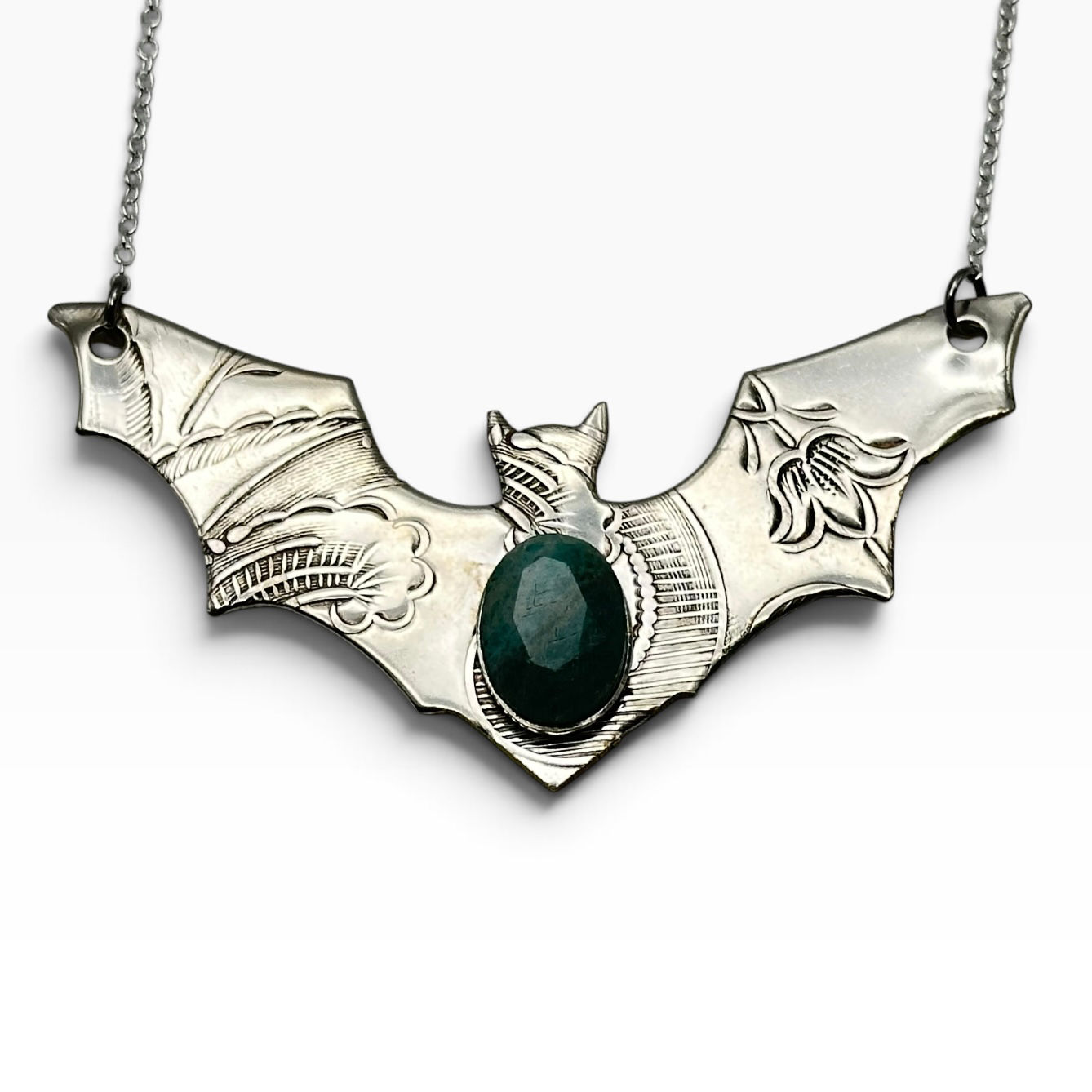 Bat necklace.