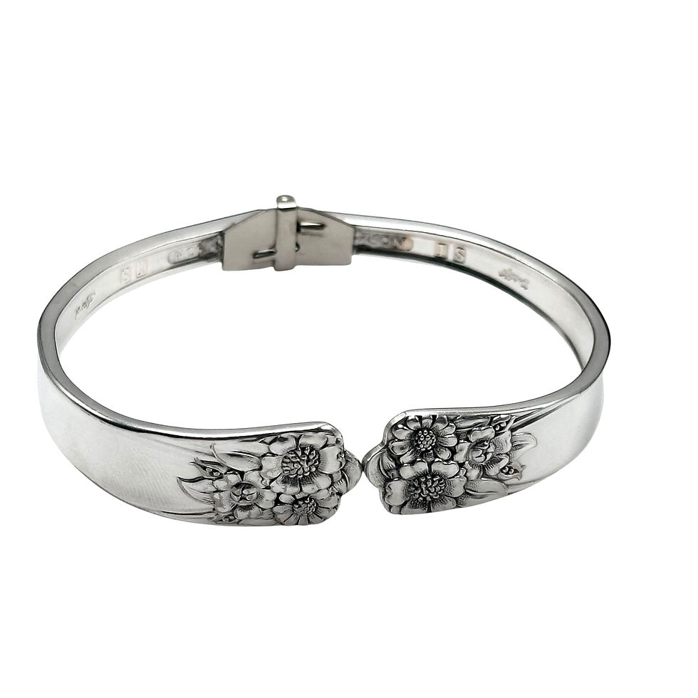 Hinged fork bracelet.